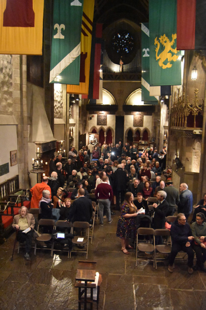 A crowd gathers for the memorial for Gerrit Lansing at Gloucester's Hammond Castle, Feb. 24, 2018. (Greg Cook)