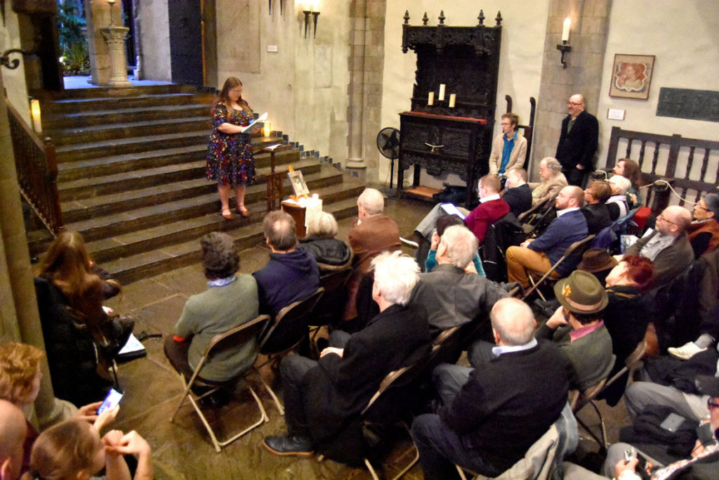 Amanda Cook speaks at the memorial for Gerrit Lansing at Gloucester's Hammond Castle, Feb. 24, 2018. (Greg Cook)