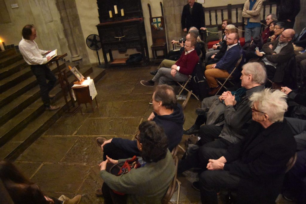 Patrick Doud speaks at the memorial for Gerrit Lansing at Gloucester's Hammond Castle, Feb. 24, 2018. (Greg Cook)