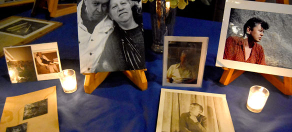 Photos of Gerrit Lansing displayed during the memorial for him at Gloucester's Hammond Castle, Feb. 24, 2018. (Greg Cook)