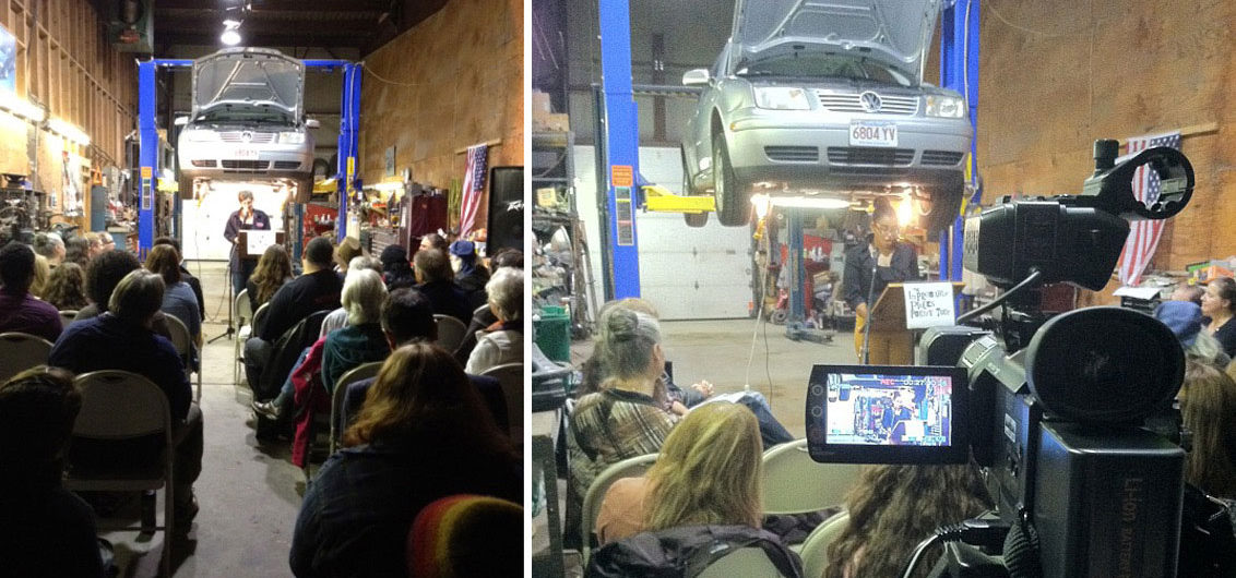 Reading in an auto shop during an Improbable Places Poetry Tour event. (courtesy)