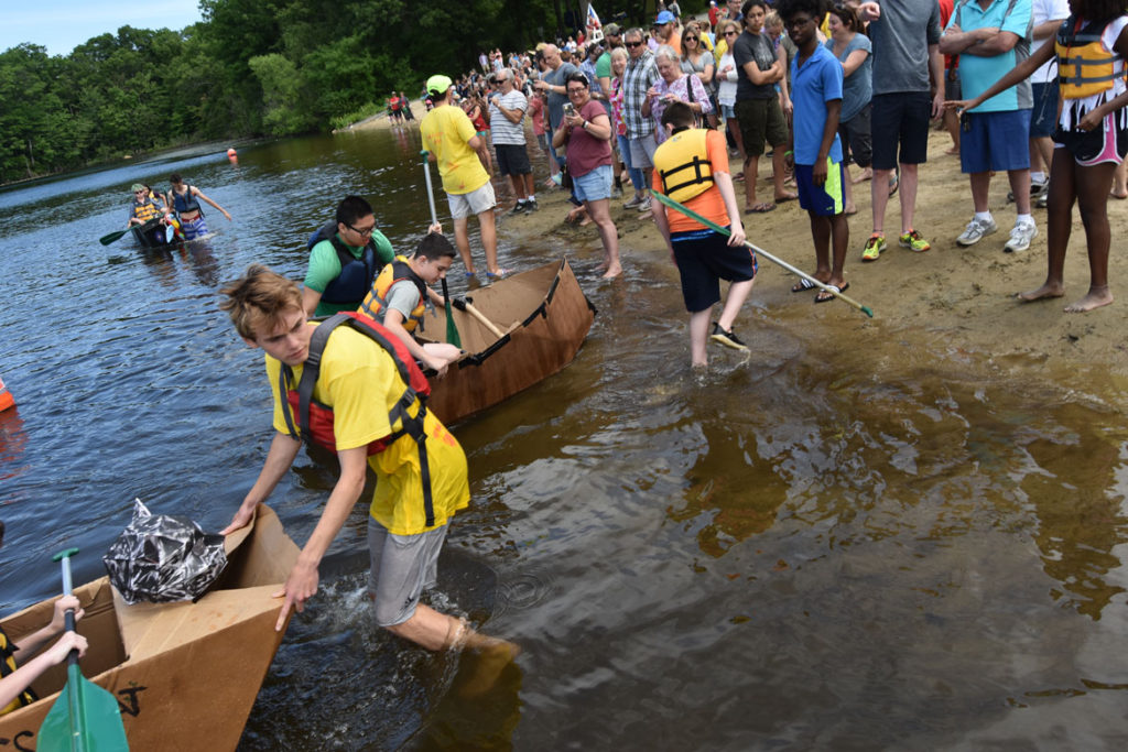 Cardboard Canoe Races at at Wright's Pond in Medford, June 10, 2018. (Greg Cook)