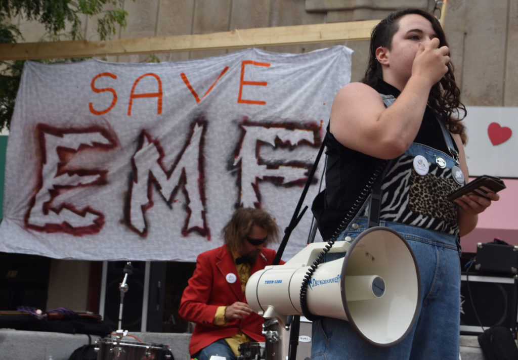 Sophia Belle speaks at the "Save EMF" rally in Harvard Square, Cambridge, June 16, 2018. (Greg Cook)