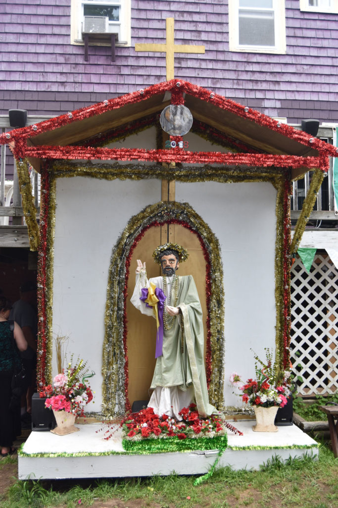 The St. Peter statue at the Crazy Hat Ladies' (Robyn Clayton McNair and Amy Clayton) annual Orchard Street Fiesta Bash, June 30, 2018. (Greg Cook)