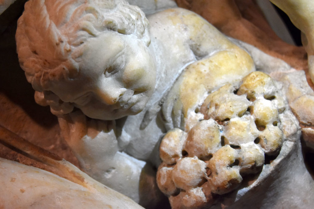 A bit of blue is visible between the grapes here on the Gardner Museum's Farnese Sarcophagus. (Greg Cook)