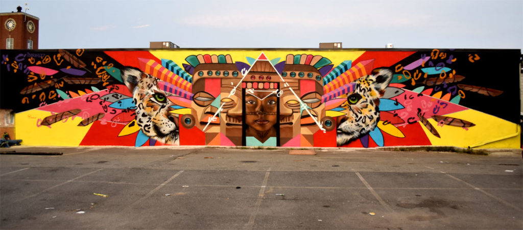 Victor "Marka27" Quiñonez's mural "Rebirth" at 2 Union Square, Somerville, Aug. 27, 2018. (Greg Cook)