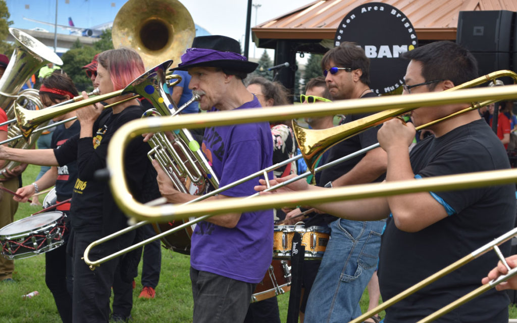 Babam (Boston Area Brigade of Activist Musicians) performs at the Boston Rise for Climate, Jobs, Immigrant Rights & Justice rally at East Boston Memorial Park, Sept. 8, 2018. (Greg Cook)