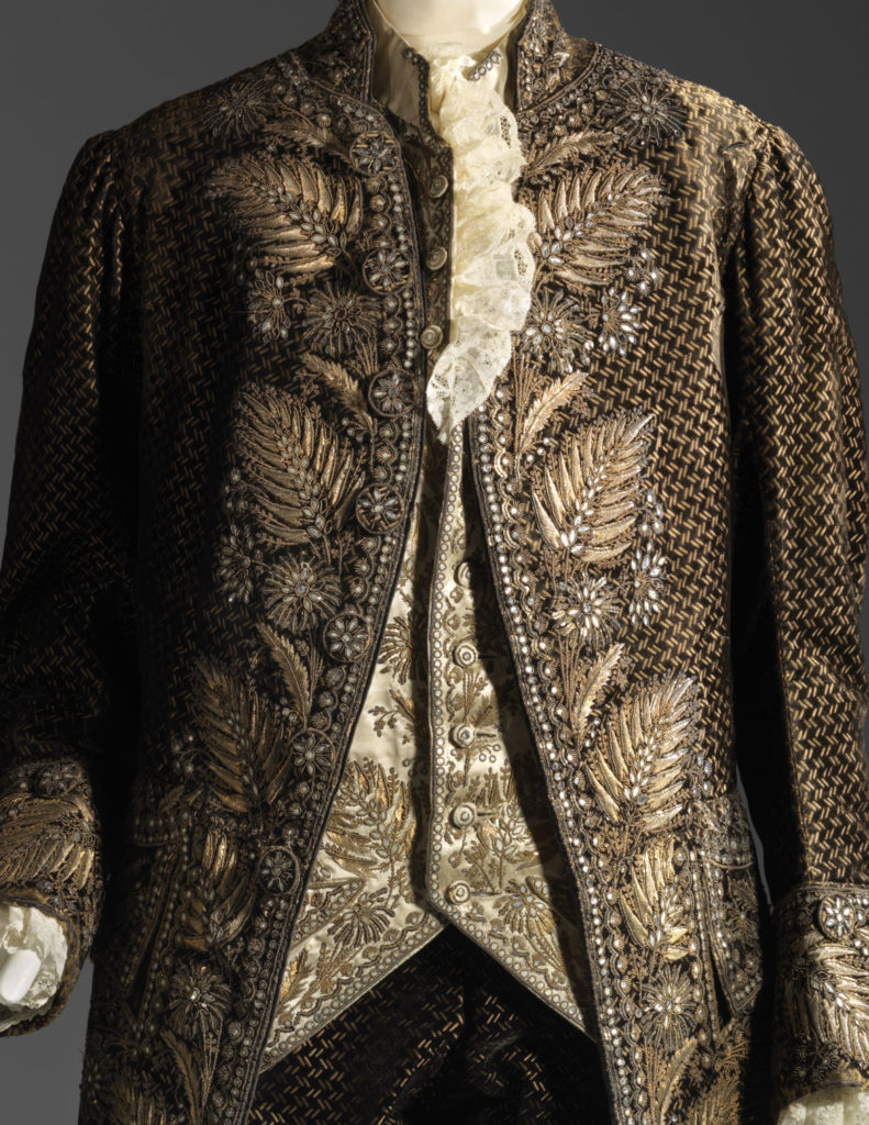 Man's court suit (coat) (detail), 1785–92, French, silk cut and uncut voided velvet embroidered with gilt silver wire, sequins, and bits of glass. (Courtesy Museum of Fine Arts, Boston)