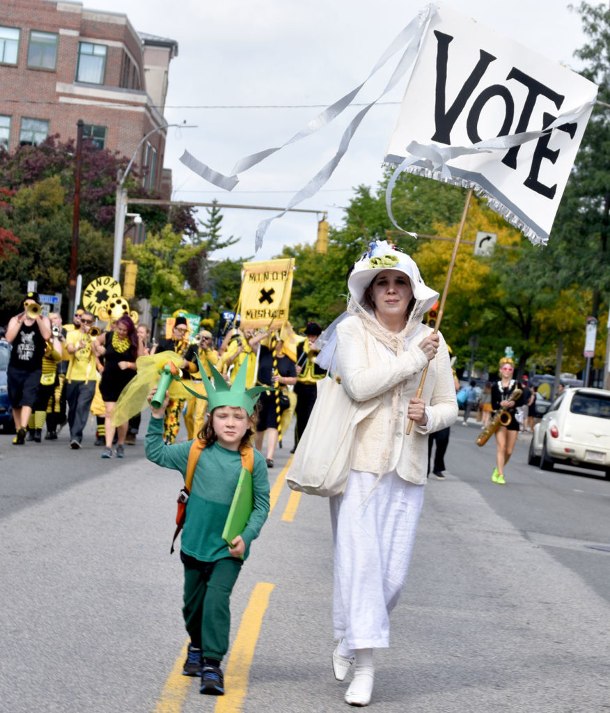 Kari Percival is a suffragette in the Honk Parade, Oct. 7, 2018. (Greg Cook)