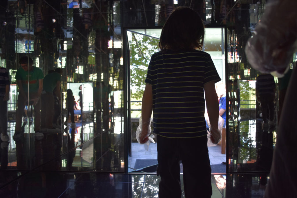 Inside Yayoi Kusama's "Where the Lights in My Heart Go," an infinity mirror room, 2016, at Decordova. (Greg Cook)