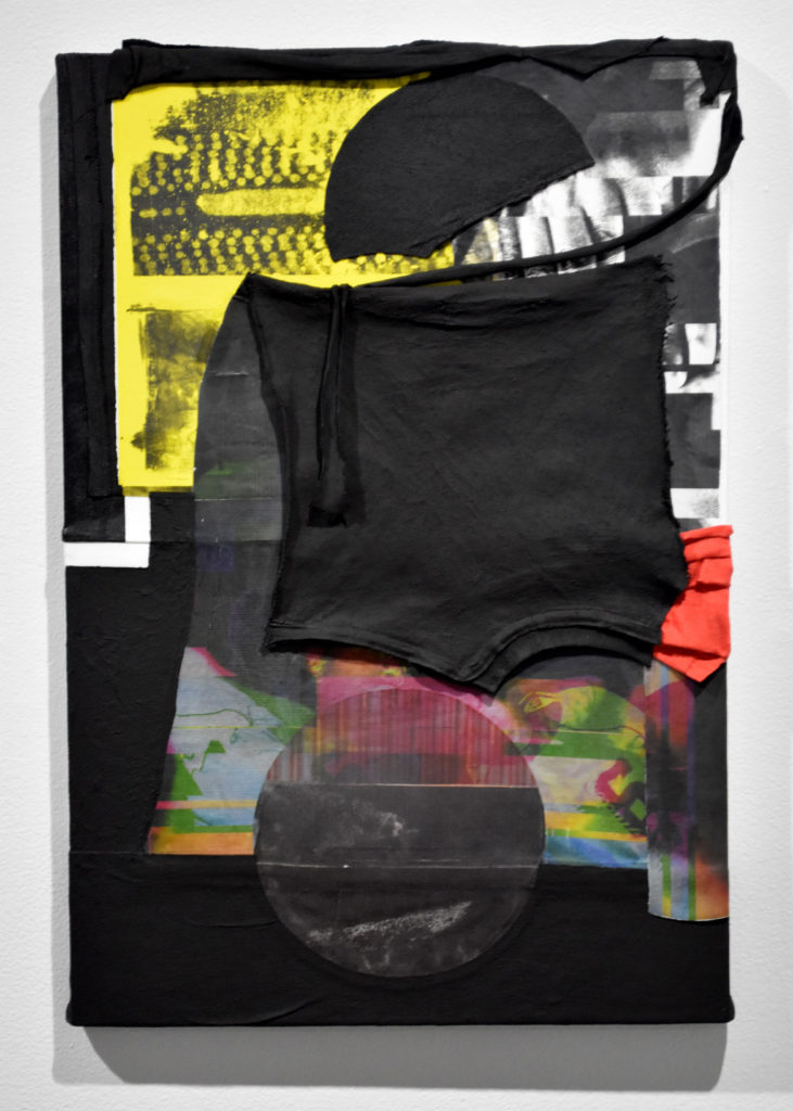 Lachelle Workman "We Were the Block's Magnum Opus," 2018, asphalt, image transfer on T-shirt, acrylic on canvas. In “Coded” at Boston Center for the Arts.