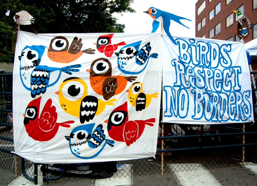 Greg Cook's "Birds Respect No Borders" banners at AS220 Foo Fest, Providence, Aug. 12, 2017. (Greg Cook)