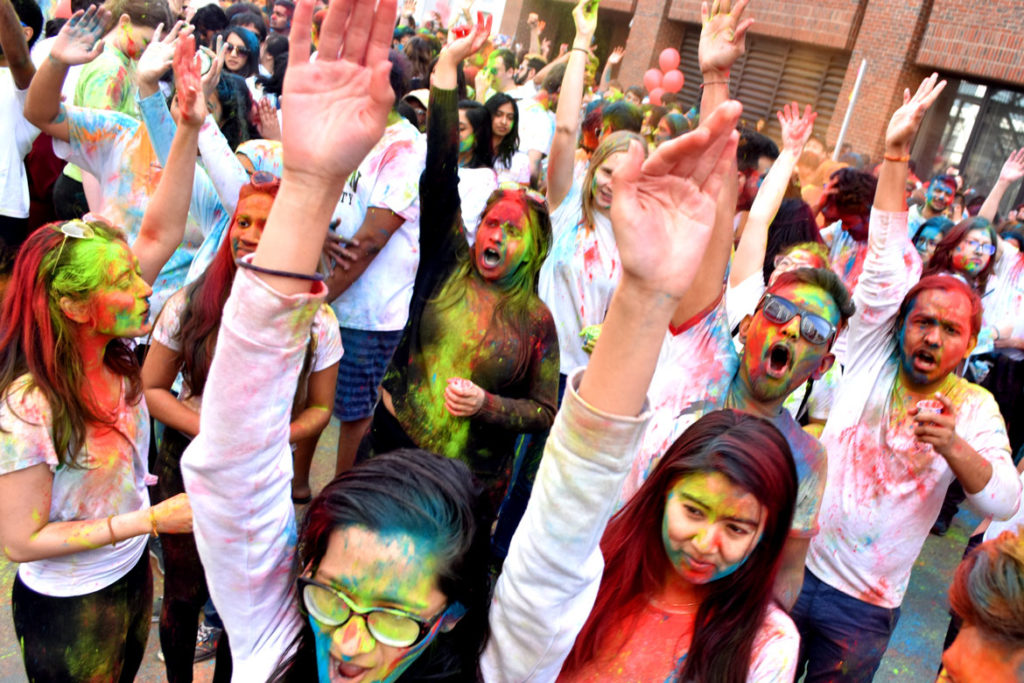 Celebrating Holi in an event organized by the Boston University Hindu Student Council, March 30, 2019. (Greg Cook)