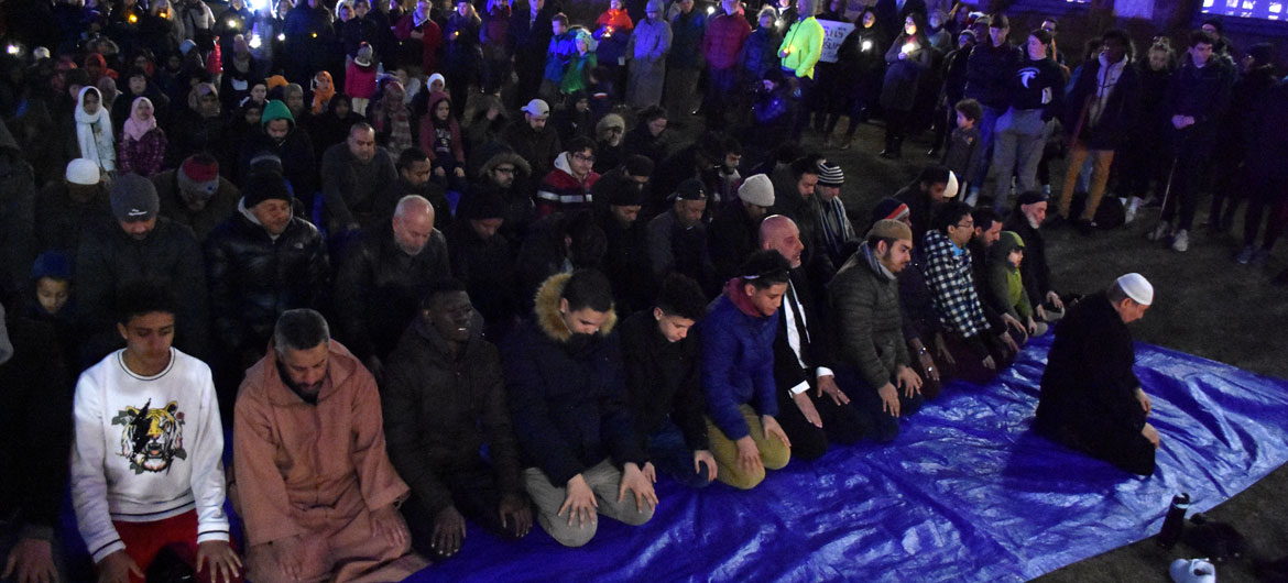 Maghrib (evening) prayer during the “Candlelight Vigil for Victims of the New Zealand Mosque Attacks." at Cambridge City Hall, March 19, 2019. (Greg Cook)