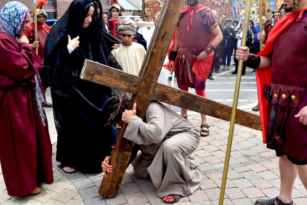 A Good Friday Stations of the Cross pageant for Easter performed in the neighborhood around Boston's Cathedral of the Holy Cross, April 19, 2019. (Greg Cook)