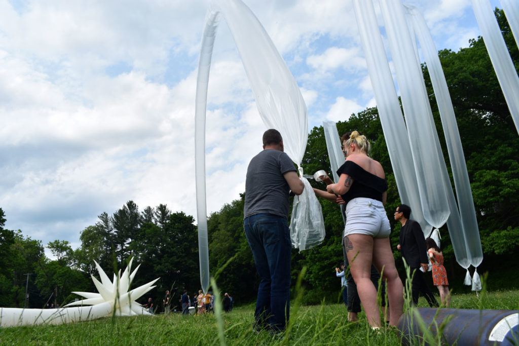 Filling tubes with helium to lift Otto Piene's "Sky Art" inflatable sculpture "Paris Star" at the Fitchburg Art Museum, June 2, 2019. (Greg Cook)