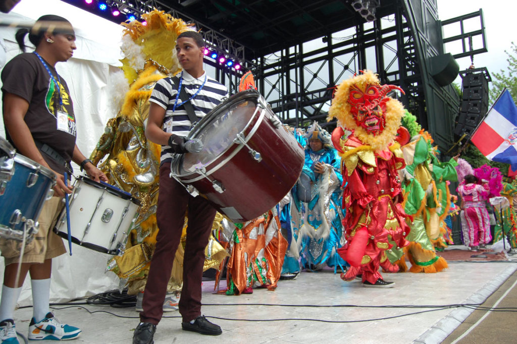 Asociacion Carnavalesca de Massachusetts performs at the Lowell Folk Festival, July 26, 2013. (Greg Cook)