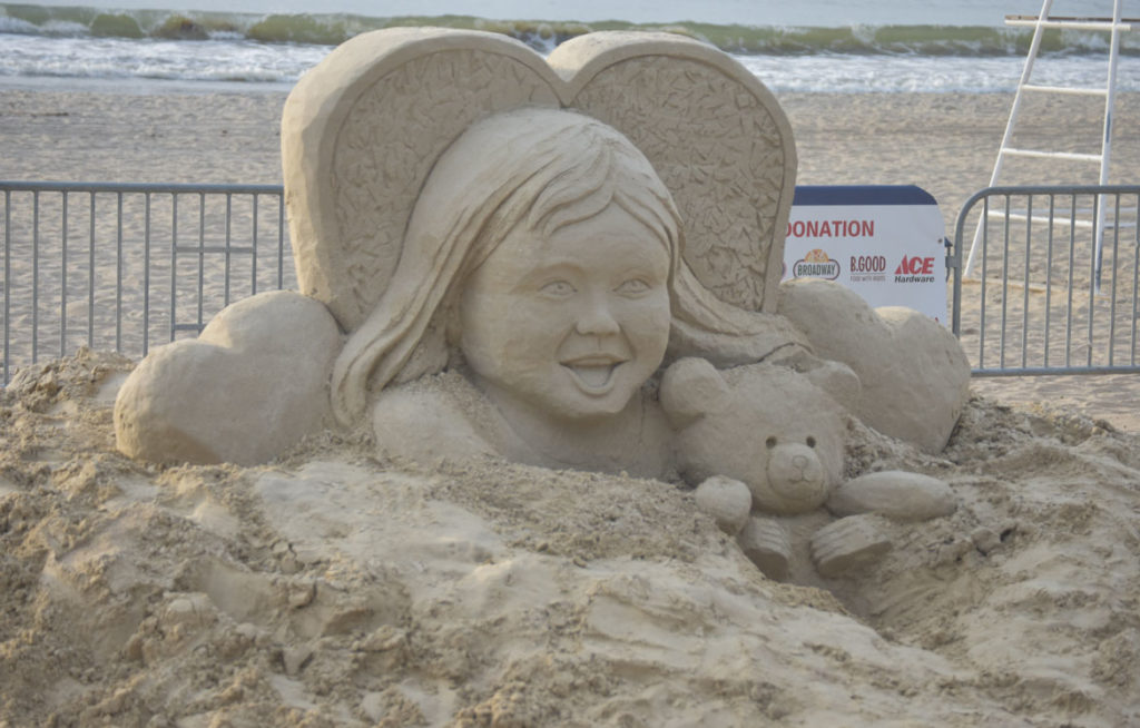 Sculpture by Deb Barrett-Cutulle of Massachusetts at the Revere Beach International Sand Sculpting Festival, Massachusetts, July 27, 2019. (Greg Cook)
