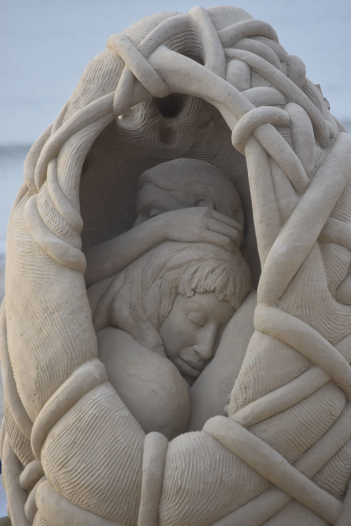 Sculpture by Melineige Beauregard of Canada at the Revere Beach International Sand Sculpting Festival, Massachusetts, July 27, 2019. (Greg Cook)