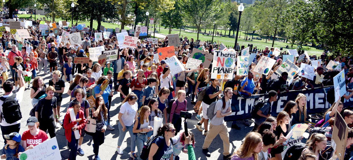 The Boston Climate Strike heads up Park Street to the Massachusetts State House, Sept. 20, 2019. (Greg Cook)