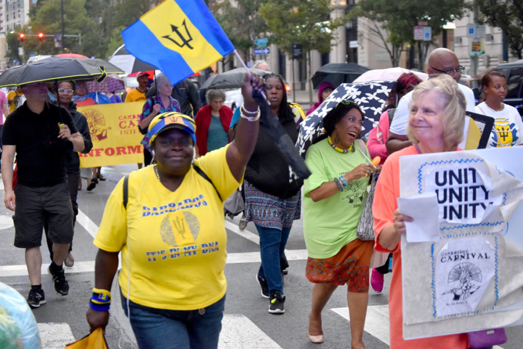 “March for Peace” down Cambridge's Massachusetts Avenue in response to the cancellation of the 2019 Carnival. Sept. 4, 2019. (Greg Cook)