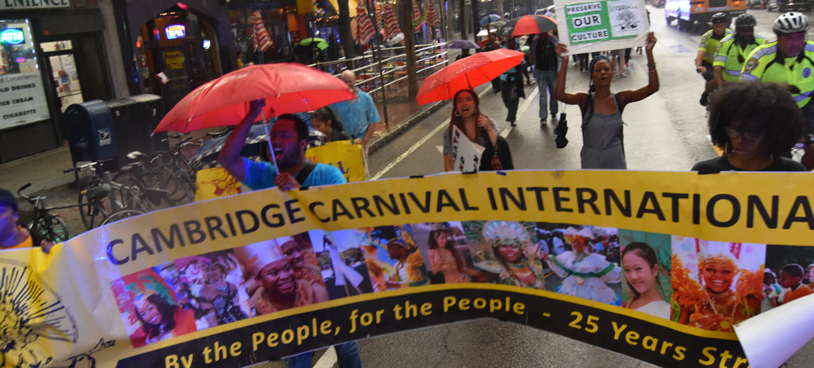 The Cambridge Carnival Committee led a “March for Peace” down Cambridge's Massachusetts Avenue in response to the cancellation of the 2019 Carnival. Sept. 4, 2019. (Greg Cook)