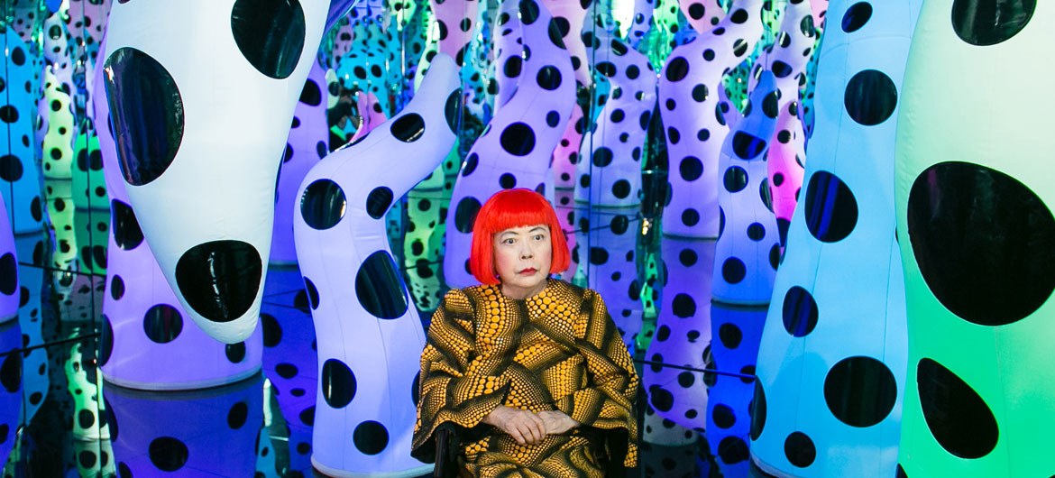 Yayoi Kusama pictured with her work "Love Is Calling" during her solo exhibition "I Who Have Arrived In Heaven" at David Zwirner gallery, New York, 2013. (Courtesy ICA Boston)