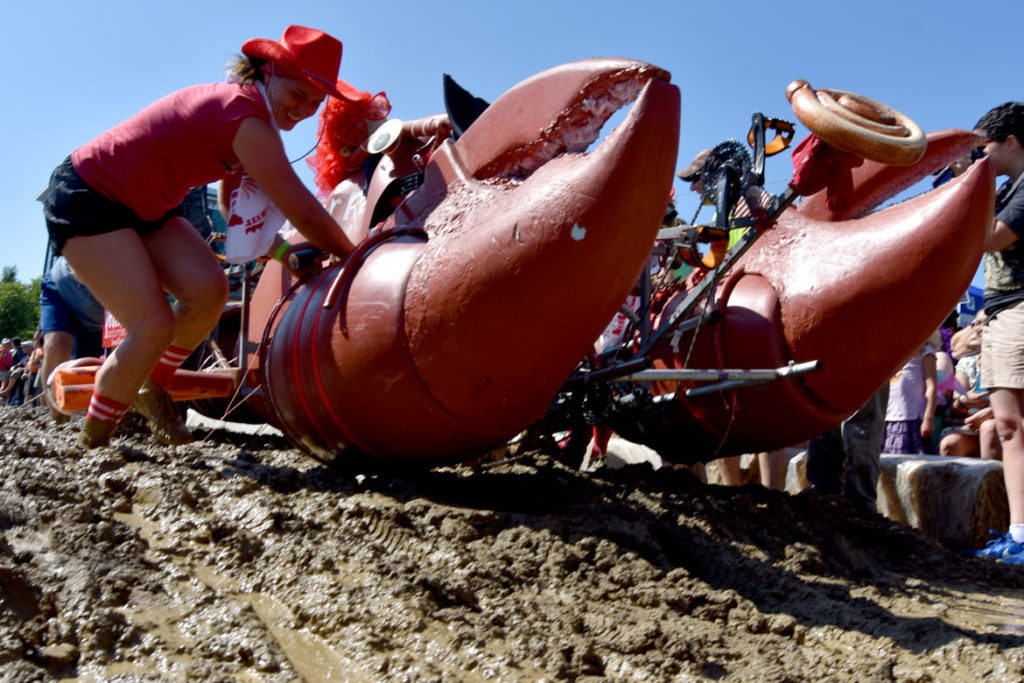 Traversing the "Maddening Mud Pit" at the Lowell Kinetic Sculpture Race, Sept. 21, 2019. (Greg Cook photo)
