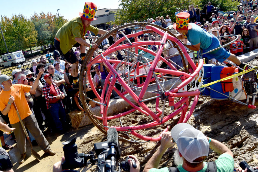 Crossing the "Maddening Mud Pit" at the Lowell Kinetic Sculpture Race, Sept. 21, 2019. (Greg Cook photo)