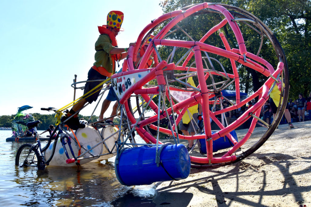 Climbing out of the Merrimack River during the Lowell Kinetic Sculpture Race, Sept. 21, 2019. (Greg Cook photo)