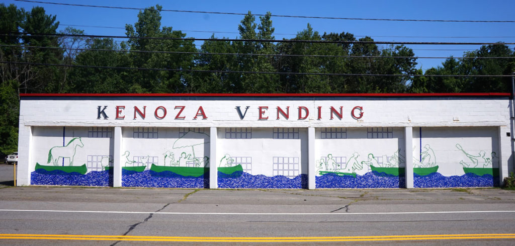 Remembering a 1936 flood with a Tape Art mural across the doors of Kenoza Vending on Route 110 in Merrimac, July 2019. From “Drawing From Our Past: A Tri-Town Tape Art Festival." (Tape Art photo)