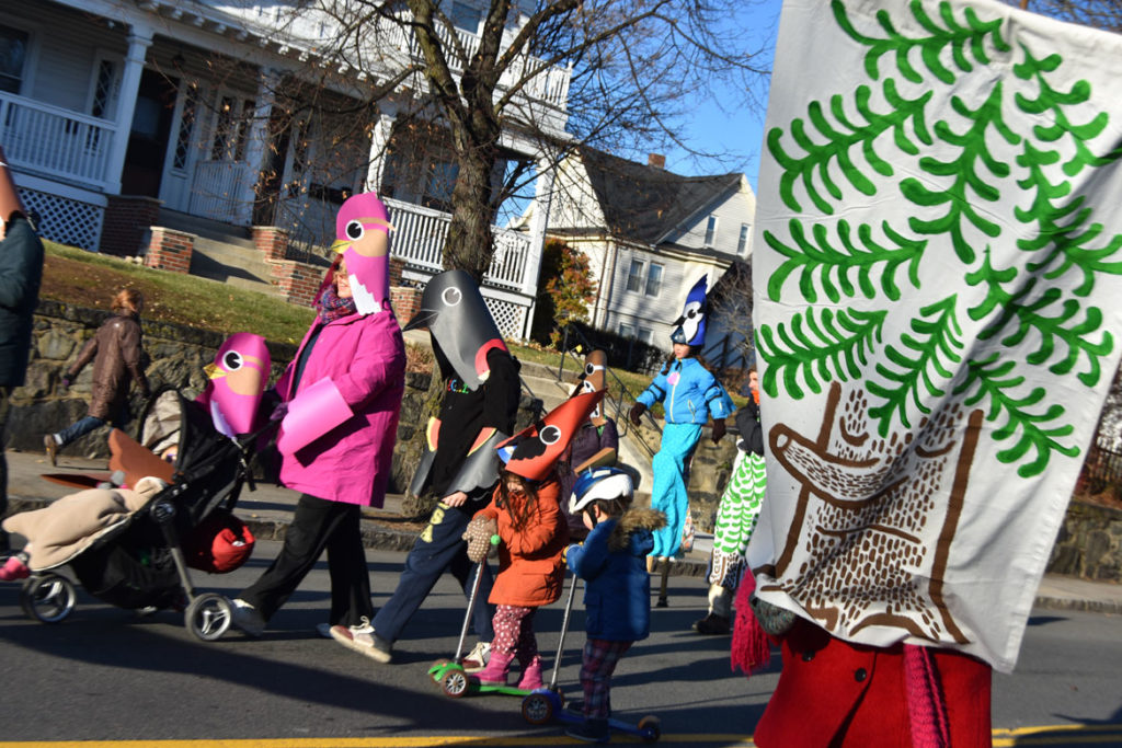 "Songbirds for Diversity" by Wonderland Spectacle Co. and friends in Malden Parade of Holiday Traditions, Nov. 30, 2019. (Greg Cook photo)