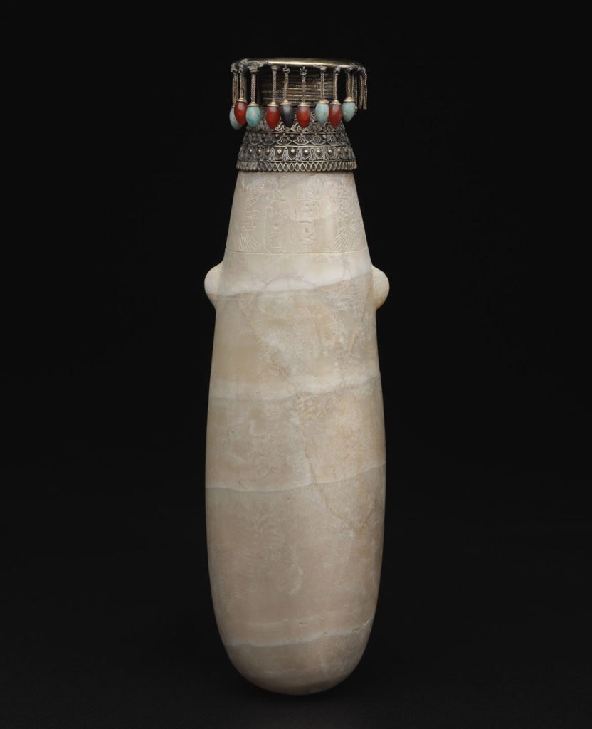 Alabastron (bag-shaped vessel) with inlaid gold and silver decoration, 593-568 BCE, Napatan Period, reign of Aspelta, ravertine (Egyptian alabaster), gold, silver, Egyptian blue, carnelian, magnetite, amazonite. From “Ancient Nubia Now” at Boston’s Museum of Fine Arts.