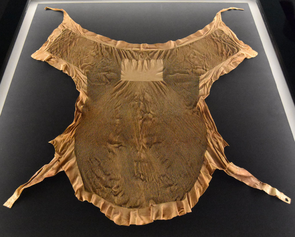 Loincloth of the Nubian man Maiherperi, a member of the royal court during the reign of Thutmose III. He was one of the few non-royal individuals buried in the Valley of the Kings. An entire gazelle skin (except for the border and a patch of leather left plain near the top to cover the buttocks) was made into a mesh by cutting it with staggered rows of tiny incisions and then pulling the skin out to expand it. (Egypt, New Kingdom, Dynasty 18, reign of Thutmose III, 1479–1425 BCE). From “Ancient Nubia Now” at Boston’s Museum of Fine Arts, Jan. 15, 2020. (Greg Cook photo)