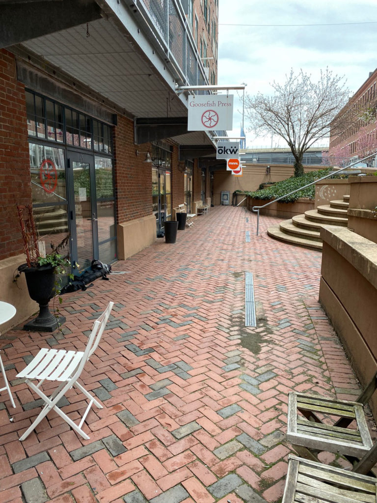 Businesses on the lower level of 450 Harrison Ave. escaped the flooding, April 15, 2020. (Photo courtesy Chris Grimley / Minni)
