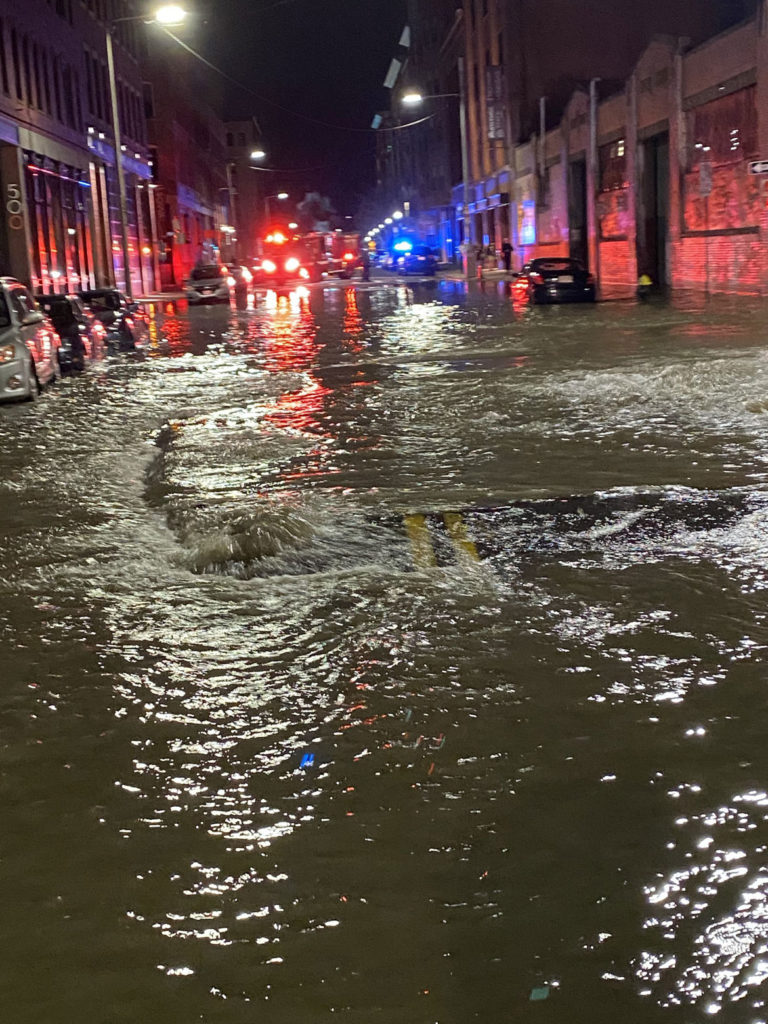 A water main break flooded Harrison Avenue in Boston's South End, April 14, 2020. (Boston Fire Department photo)