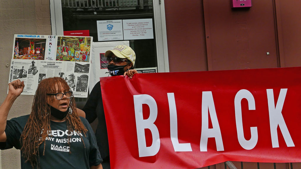 Resident artist L’Merchie Frazier speaks as artists and supporters of the African American Master Artists In Residence Program protest outside the studios building at 76 Atherton St. in Boston's Jamaica Plain neighborhood, June 27, 2020. (Photo © copyright Don West / fOTOGRAfIKS)