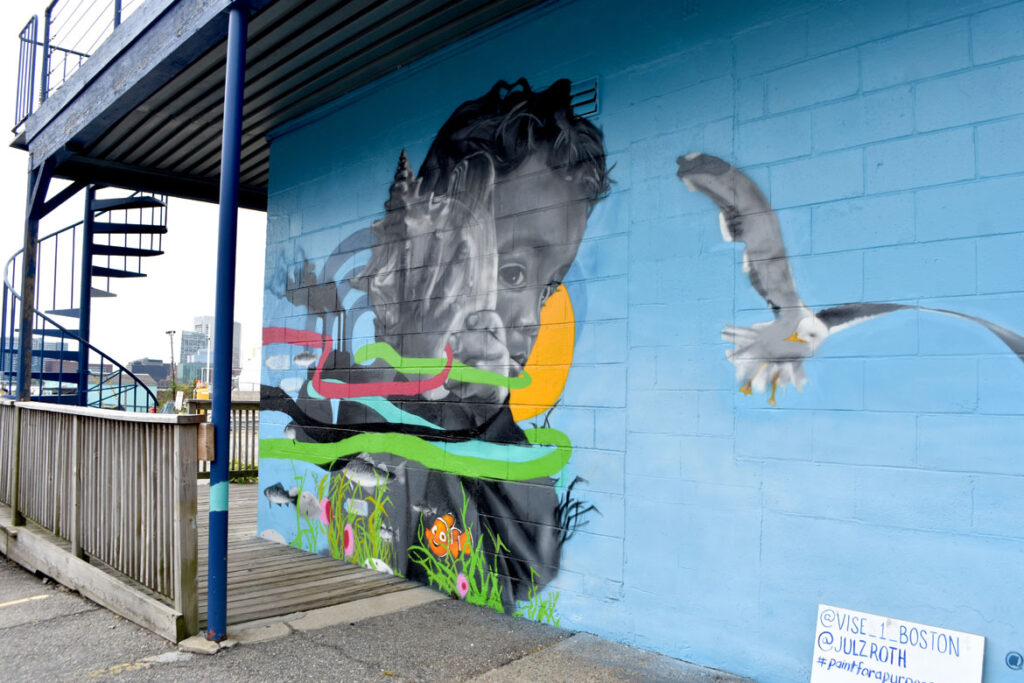 Cedric “Vise 1” Douglas and Julz Roth's mural for "Sea Walls: Artists for Oceans, Boston 2020," from PangeaSeed Foundation in collaboration with HarborArts at the Boston Harbor Shipyard in East Boston, Sept. 18, 2020. (© Greg Cook photo)