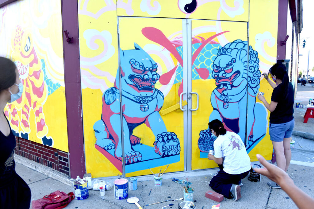 Painting mural at Wah Lum Kung Fu & Thai Chi Academy in Malden, Aug. 8, 2020. (Photo ©Greg Cook)