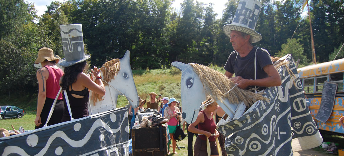 Remi Paillard (right) prepares to rehearse the Bread and Puppet Circus, Glover, Vermont, Aug. 22, 2015. (©Greg Cook photo)