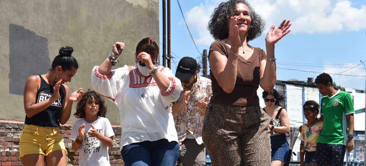 Ring shout at Ife Franklin's Juneteenth Celebration at Black Market Nubian Square as part of the premiere of her film "The Slave Narrative of Willie Mae," June 19, 2021. (©Greg Cook photo)