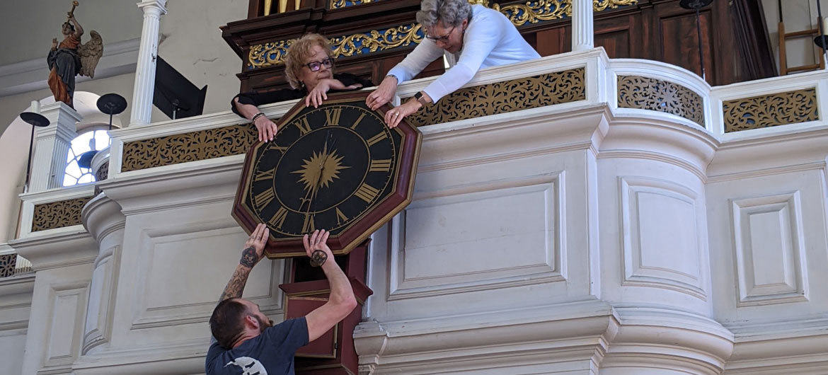 Re-installing the repaired 1726 Avery-Bennett clock at Boston's Old North Church on June 16, 2021. (Courtesy Old North Church & Historic Site)