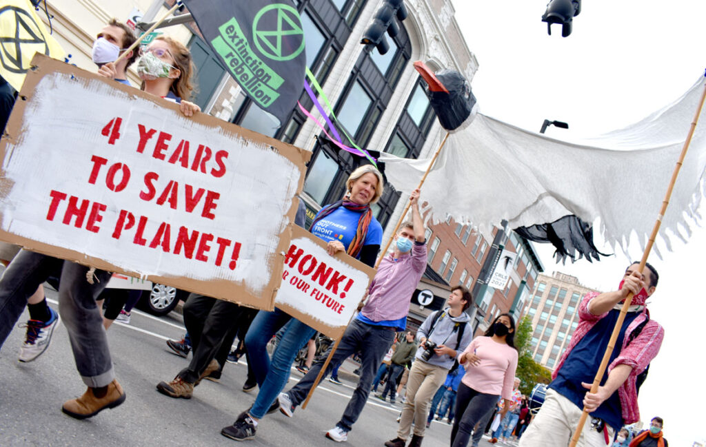 Honk For Our Future, 4 Years to Save the Planet anti-global warming march down Massachusetts Avenue, Cambridge, in collaboration with Extinction Rebellion Youth, Oct. 9, 2021. (©Greg Cook photo)