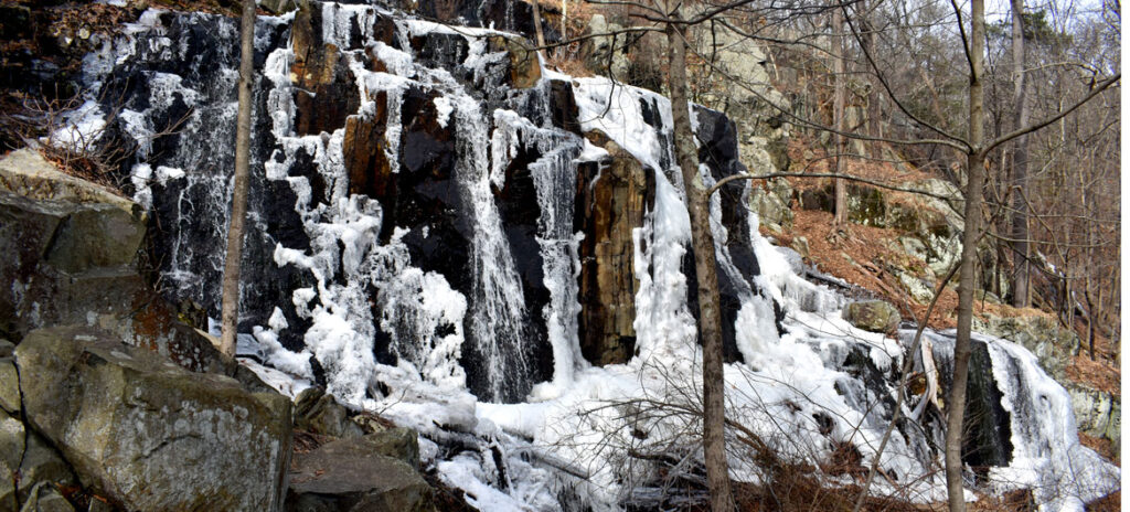 The Cascade waterfall along Shilly Shally Brook in the Middlesex Fells in Melrose, Feb. 19, 2022. (©Greg Cook 2022)