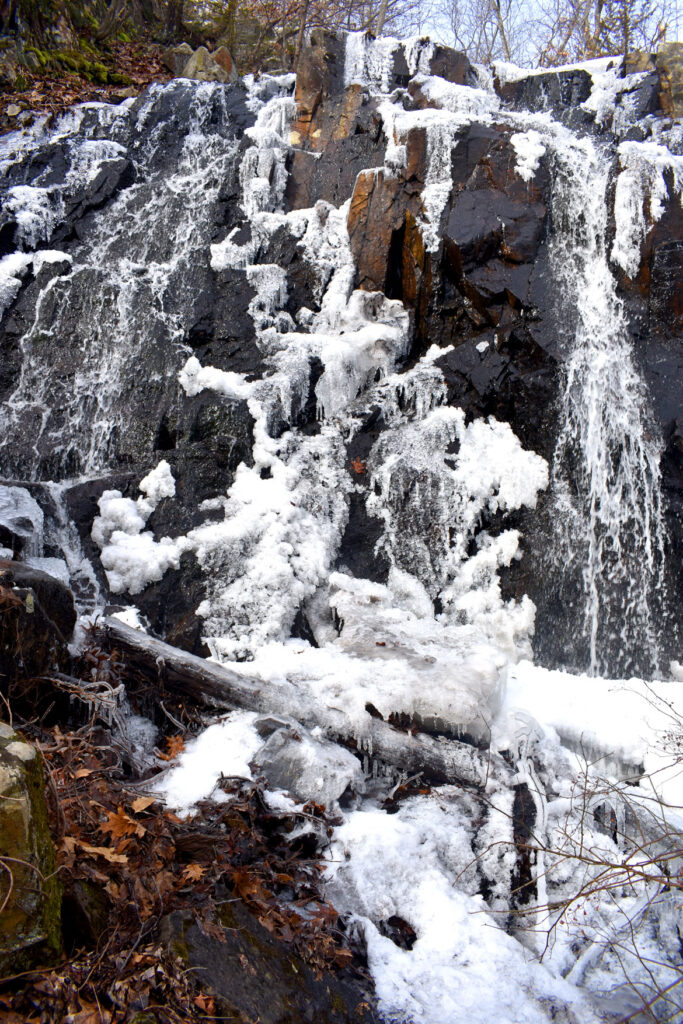 The Cascade waterfall along Shilly Shally Brook in the Middlesex Fells in Melrose, Feb. 19, 2022. (©Greg Cook 2022)