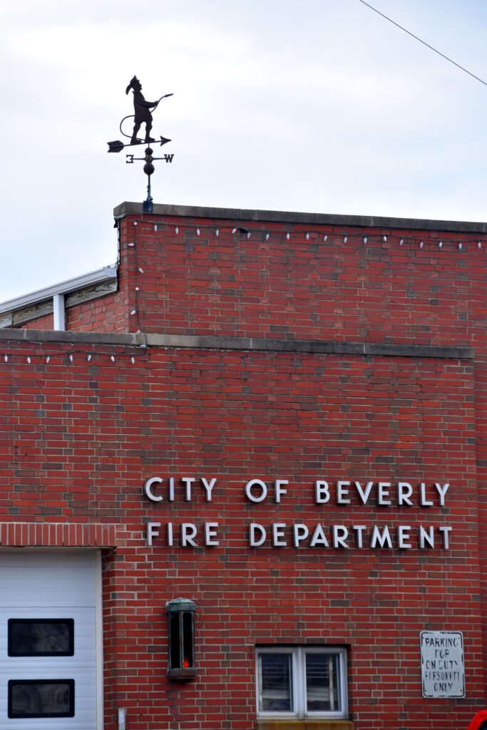 Firefighter weathervane atop Beverly Farms fire station, Beverly, Massachusetts, March 6, 2022. (©Greg Cook photo)