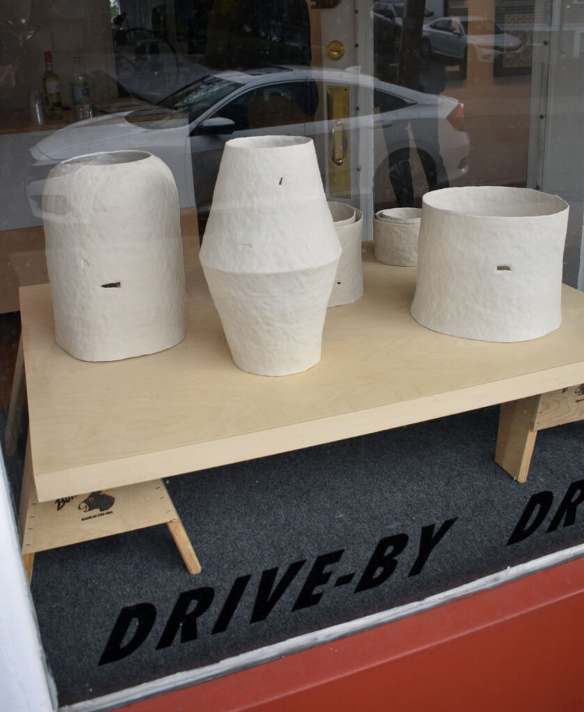 Josephine Burr "pinched volume" series of porcelains at Drive-By Projects, April 2022. (Greg Cook photo)