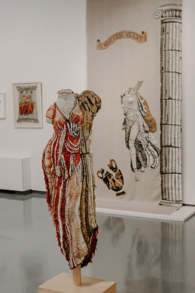 Marilyn Pappas, (foreground) "Nevertheless She Persisted II," 2018, cotton, linen, wood. (Fuller Craft Museum)