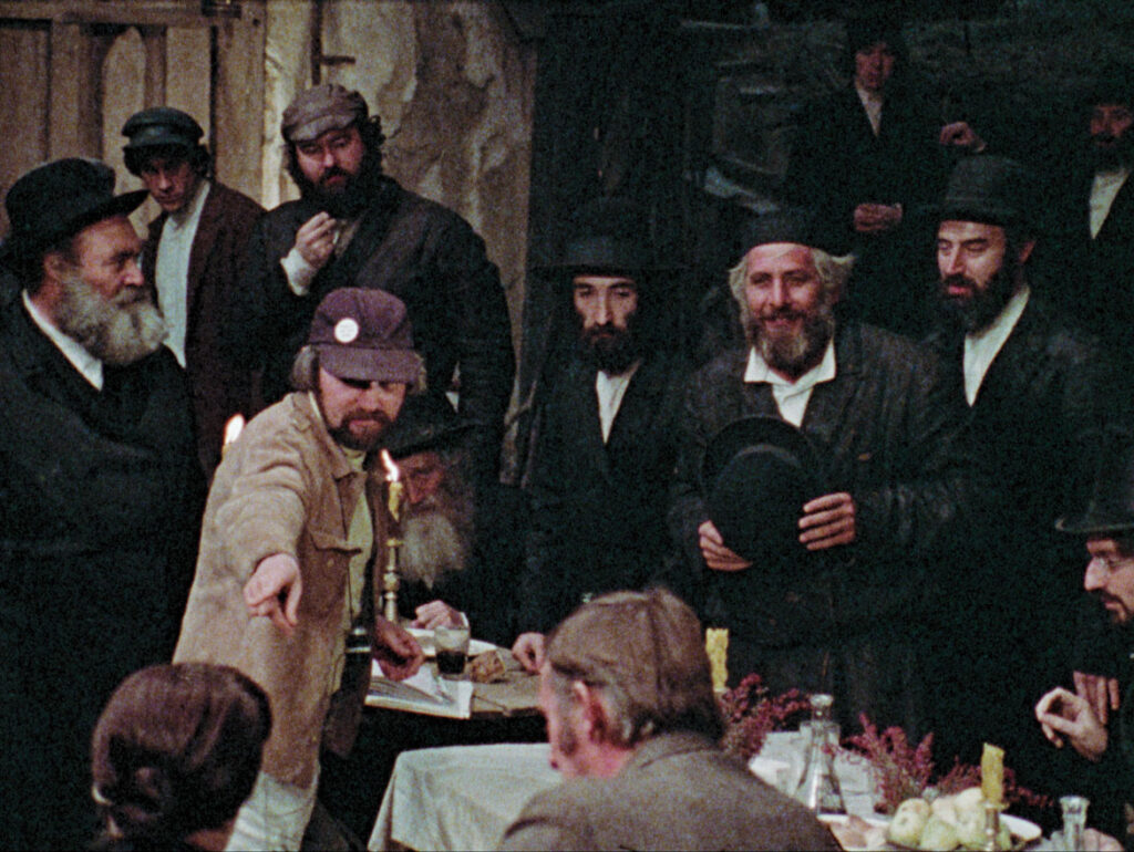 Norman Jewison (left center) directs Topol, as Tevye (right center) in the 1971 film "Fiddler on the Roof," as seen in the 2021 documentary “Fiddler’s Journey to the Big Screen."