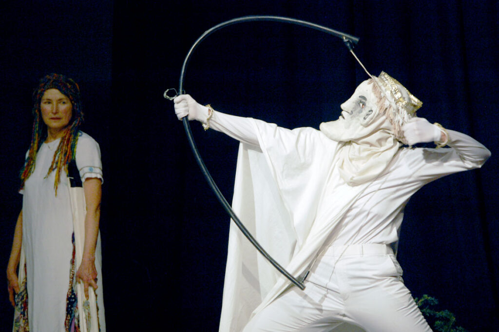Genevieve Yeuillaz (left) performs in Bread and Puppet's "The Return of Ulysses," Boston Center for the Arts, Jan. 28, 2011. (©Greg Cook photo)